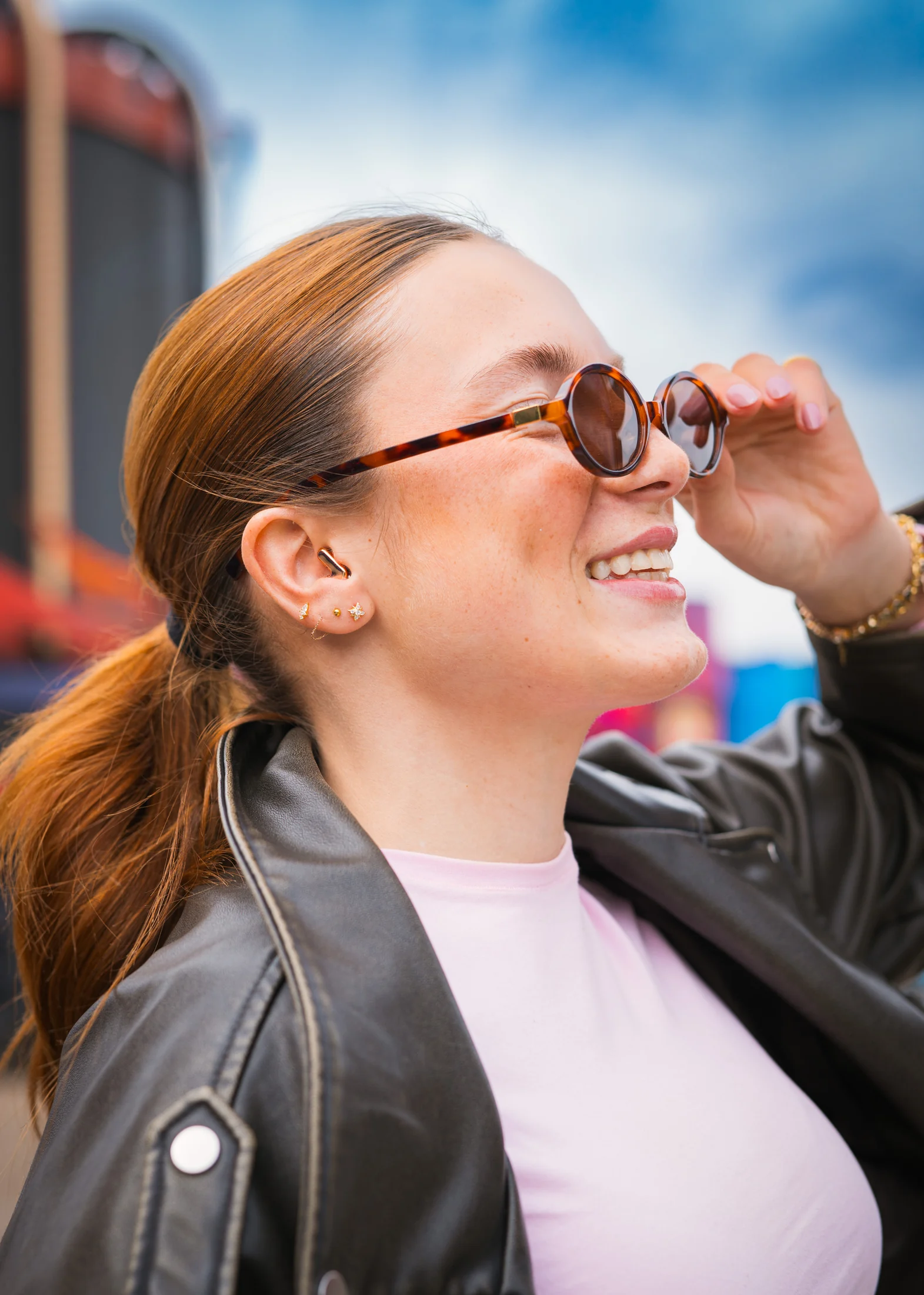 Festival guest wearing Alpine hearing protection outdoors
